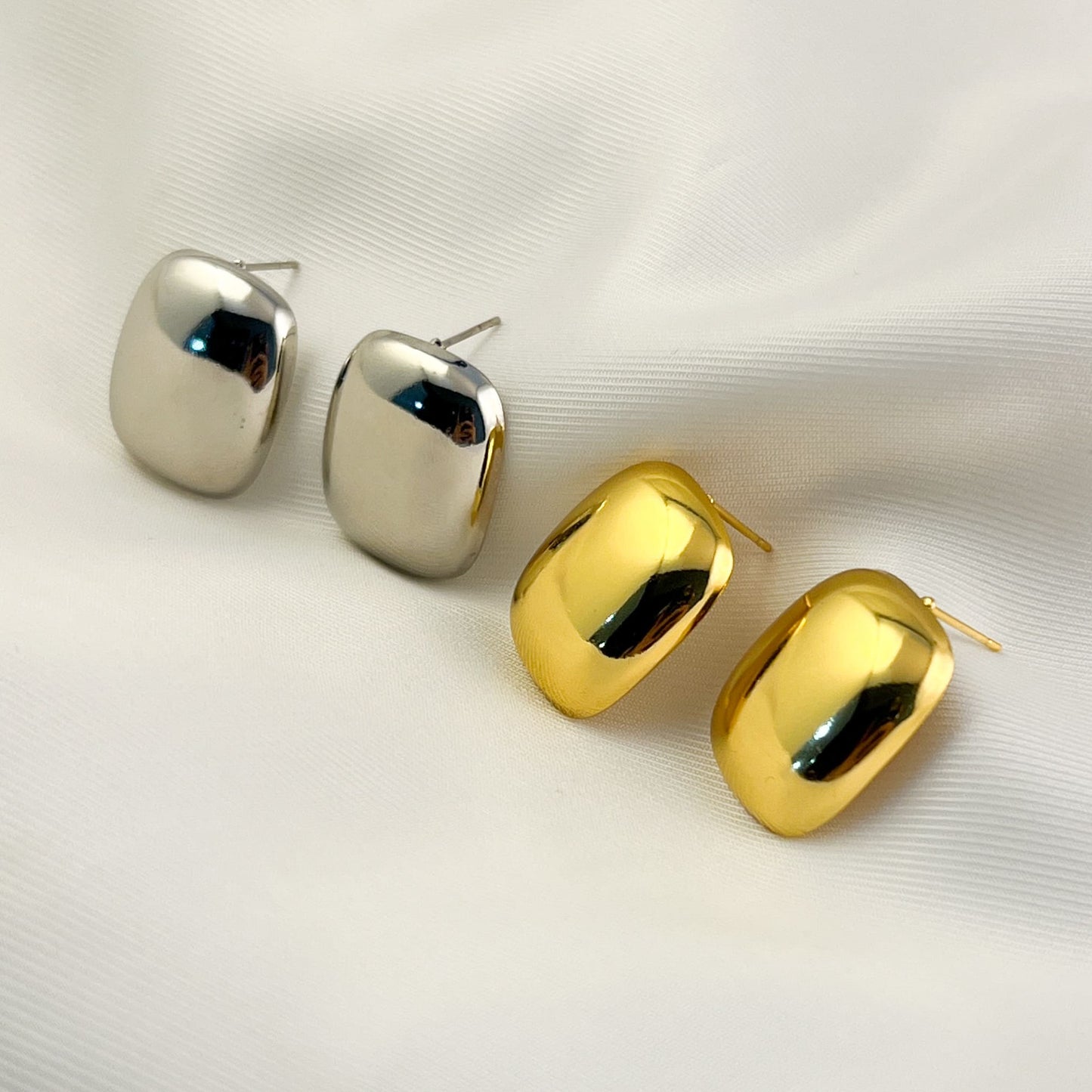 Aretes pegados acero inoxidables cuadro redondeado liso