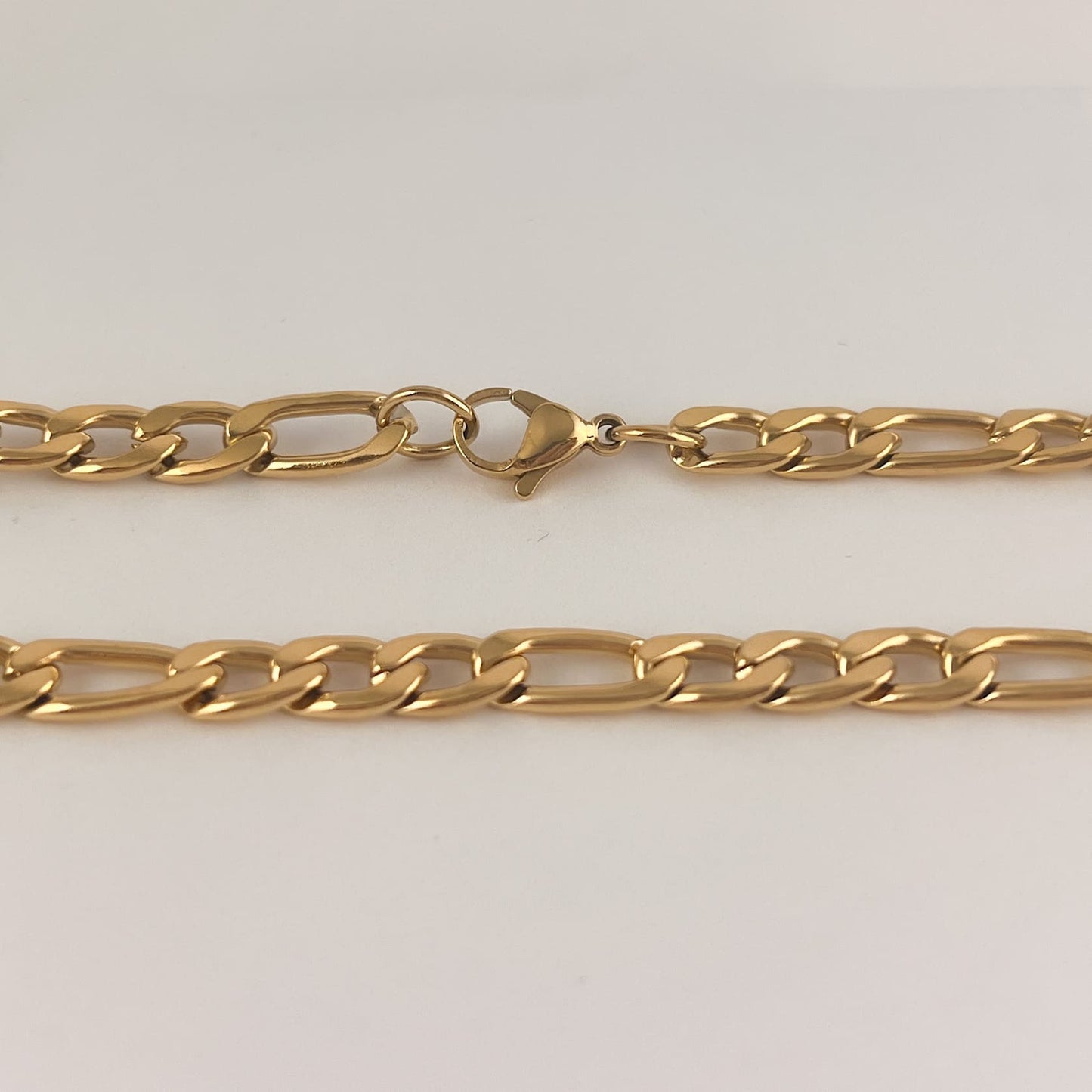 Cadena acero inoxidable eslabón 3x1 tono dorado