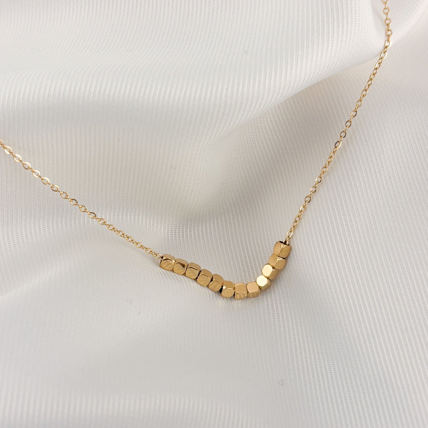 Collar acero inoxidable dots dorado