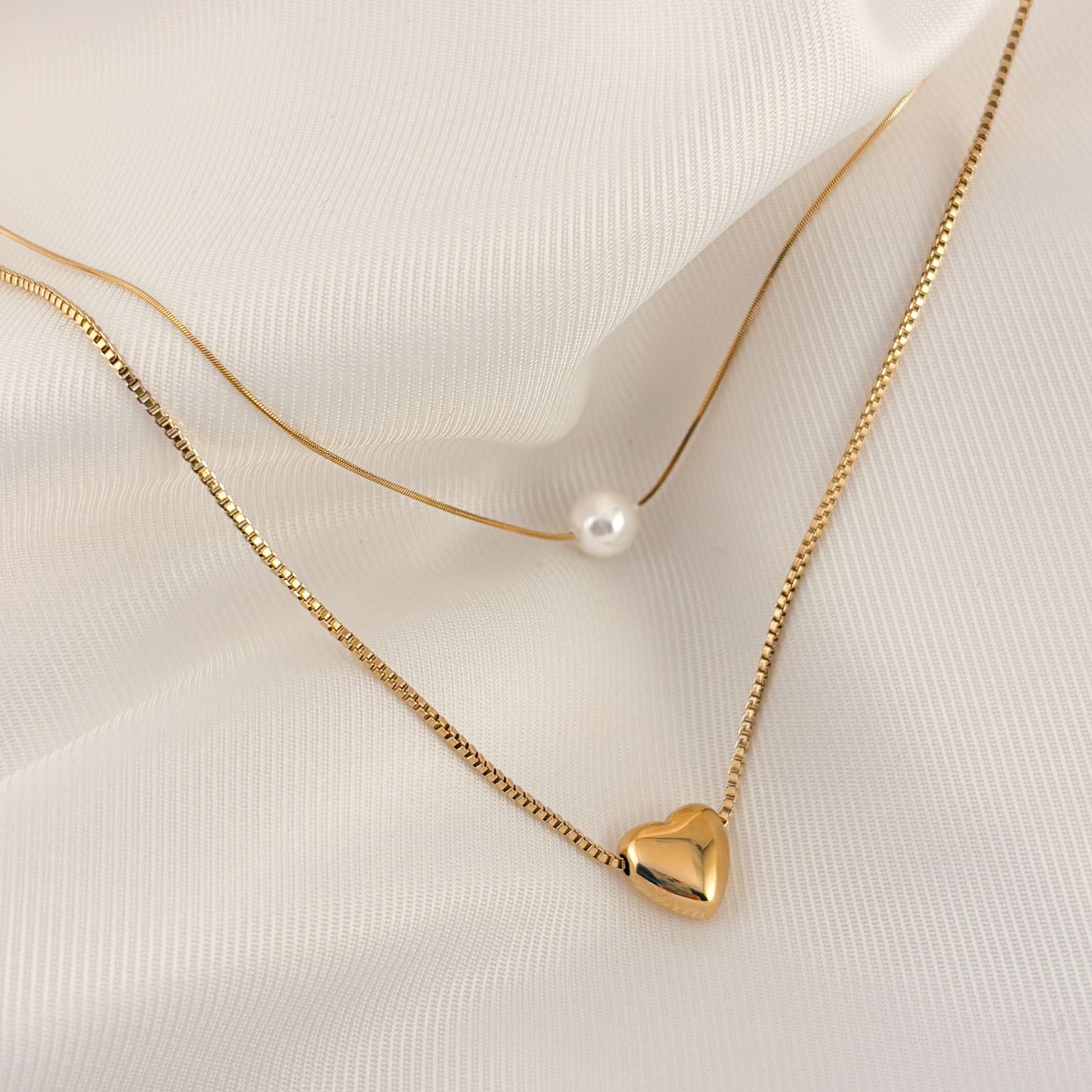 Collar doble acero inoxidable perla y corazón dorado