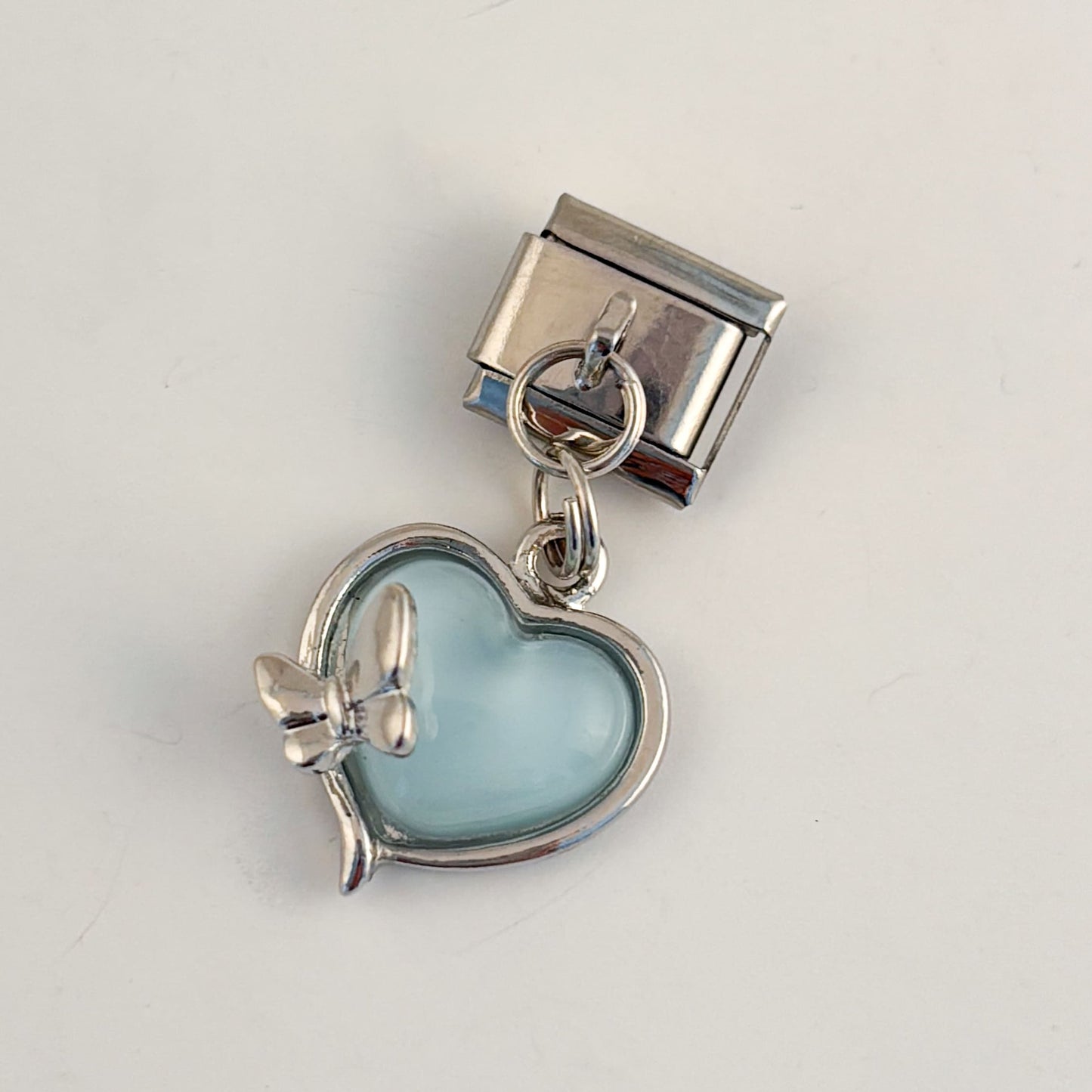 Charm colgante para pulsera italiana corazon cristal azul con mariposa