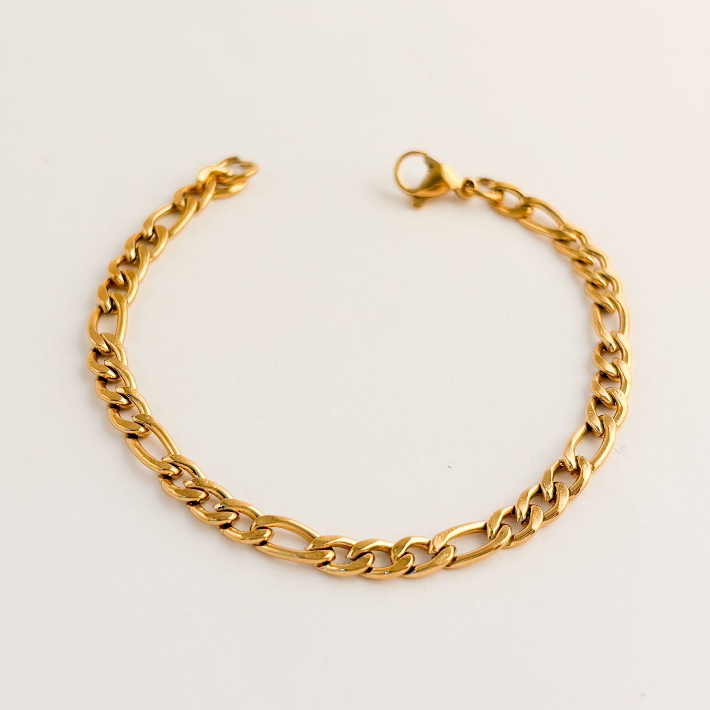 Pulsera acero inoxidable tres por uno 16 cm dorada dama/niña