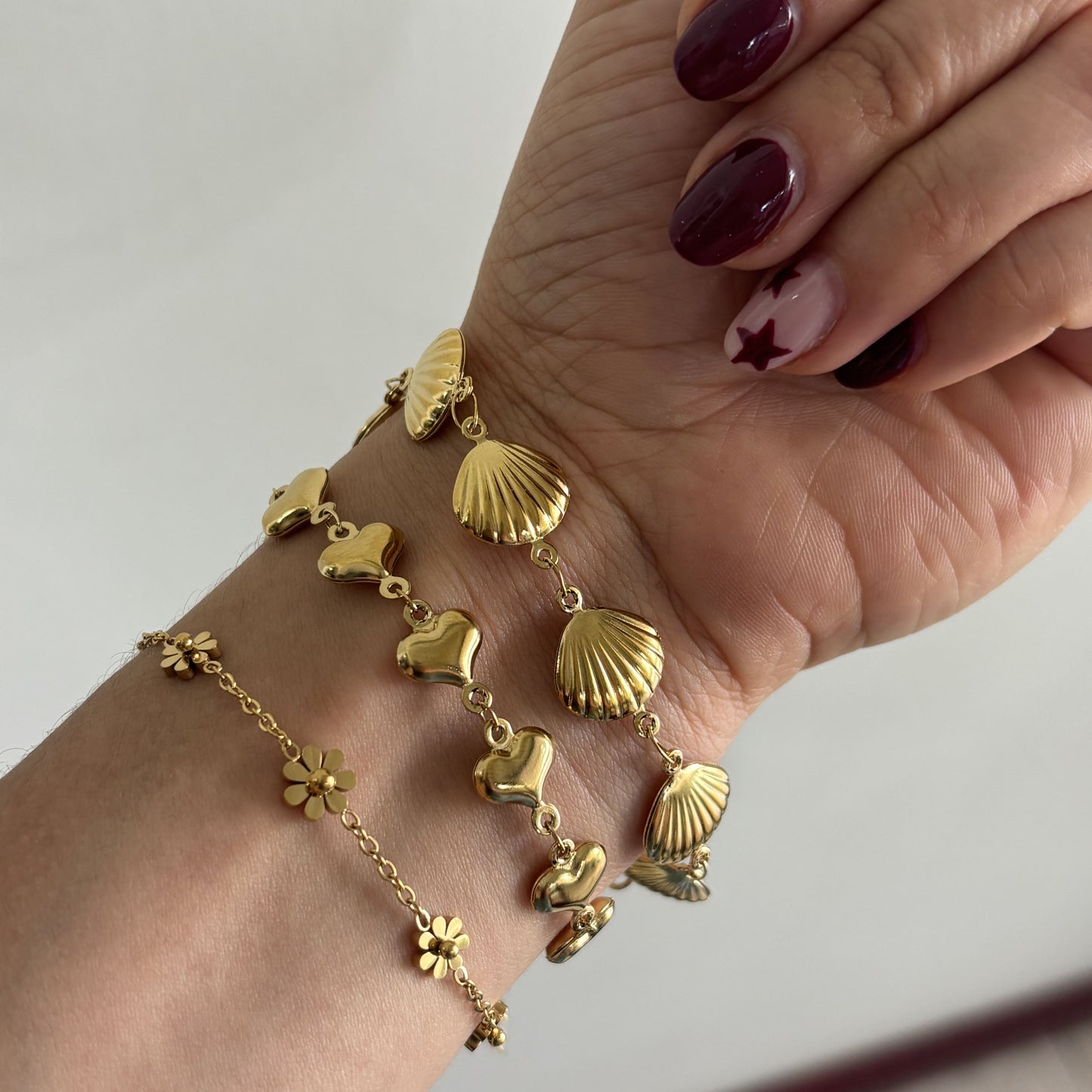 Pulsera corazones acero inoxidable dorado