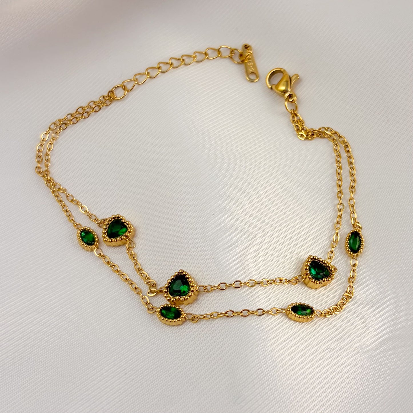 Pulsera acero inoxidable doble corazones verdes dorado