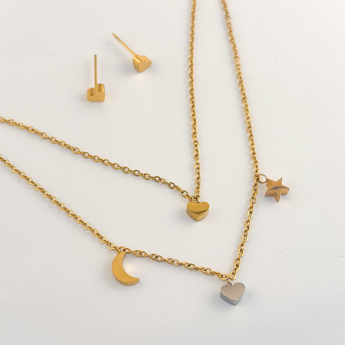 Set aretes y collar doble acero corazón luna estrella tricolor
