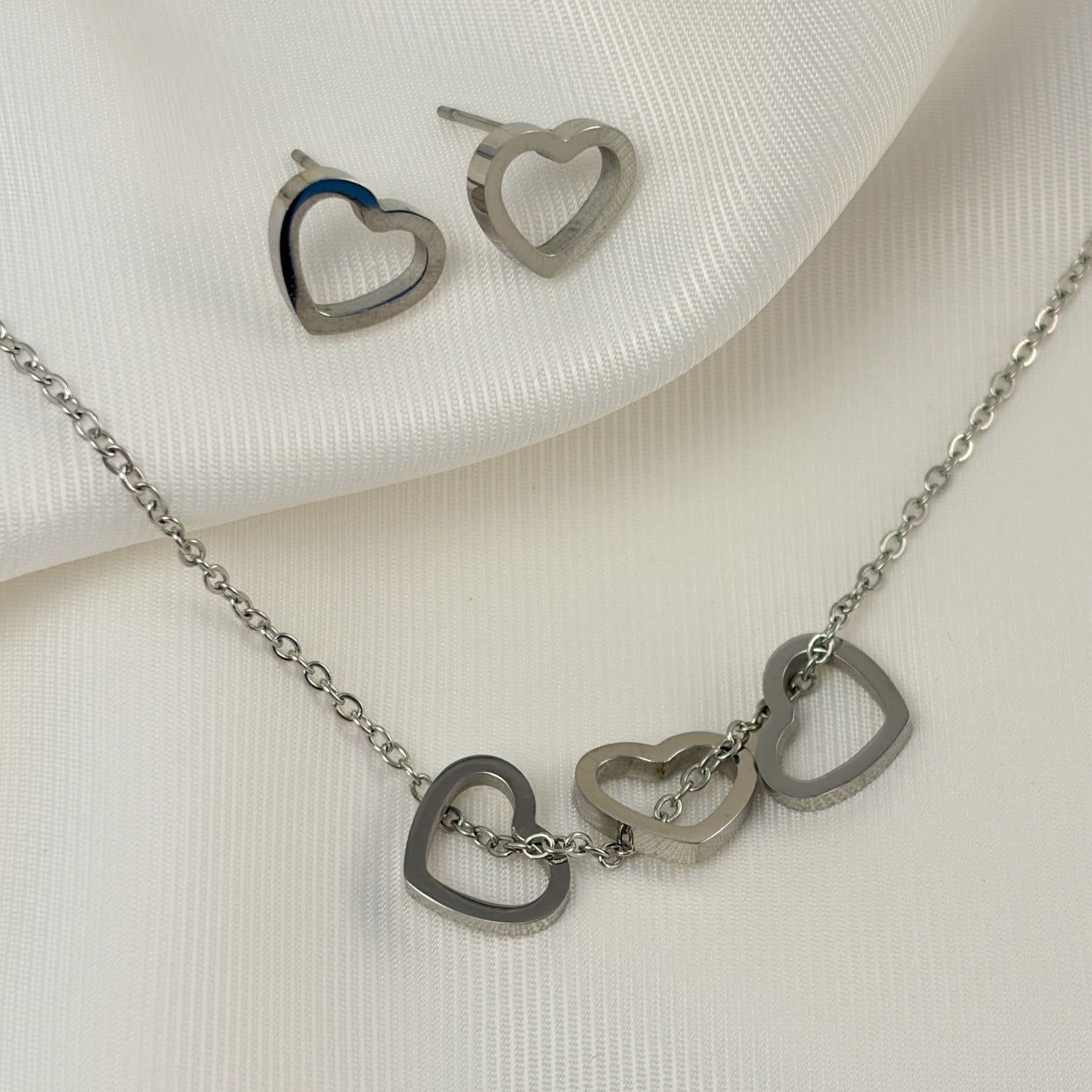Set aretes y collar corazónes contorno acero inoxidable