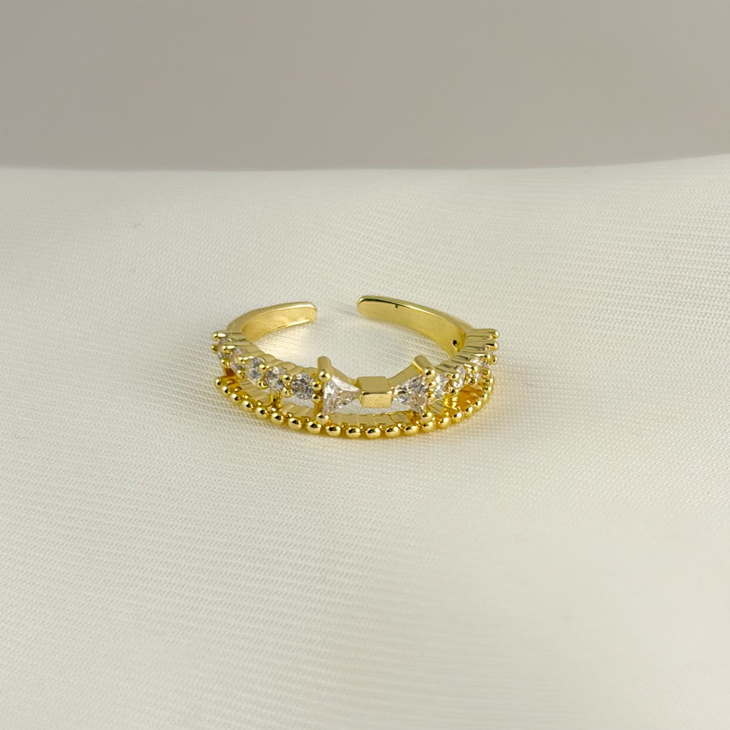 Anillo doble zirconias moƱo chapa de oro ajustable