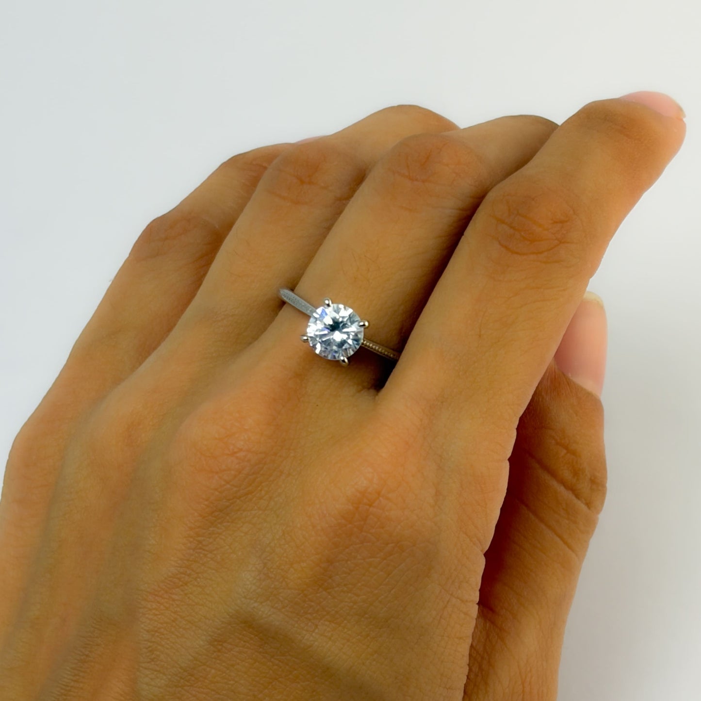 Anillo solitario baño de rodio tallas
