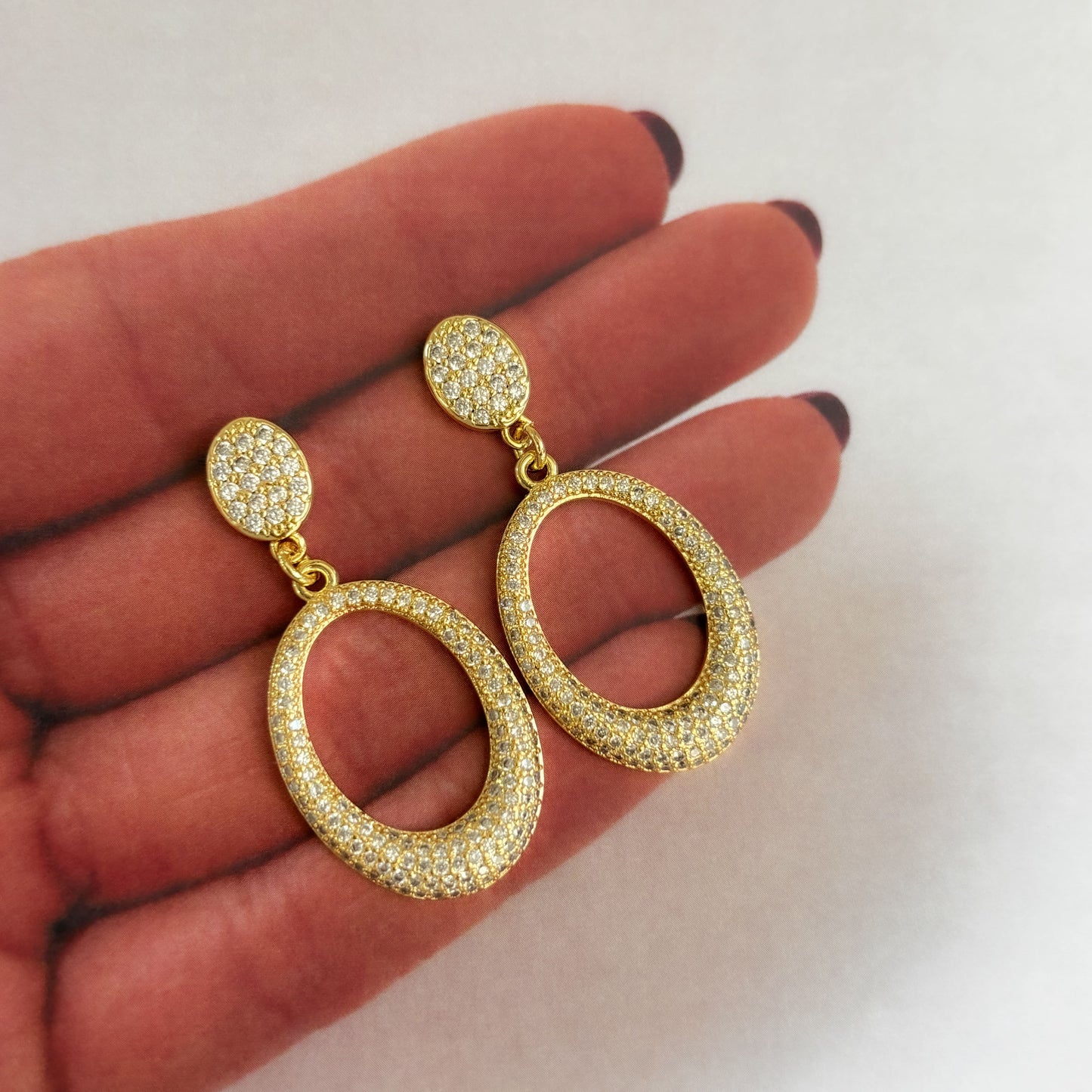 Aretes colgantes ovalados zirconias chapa de oro