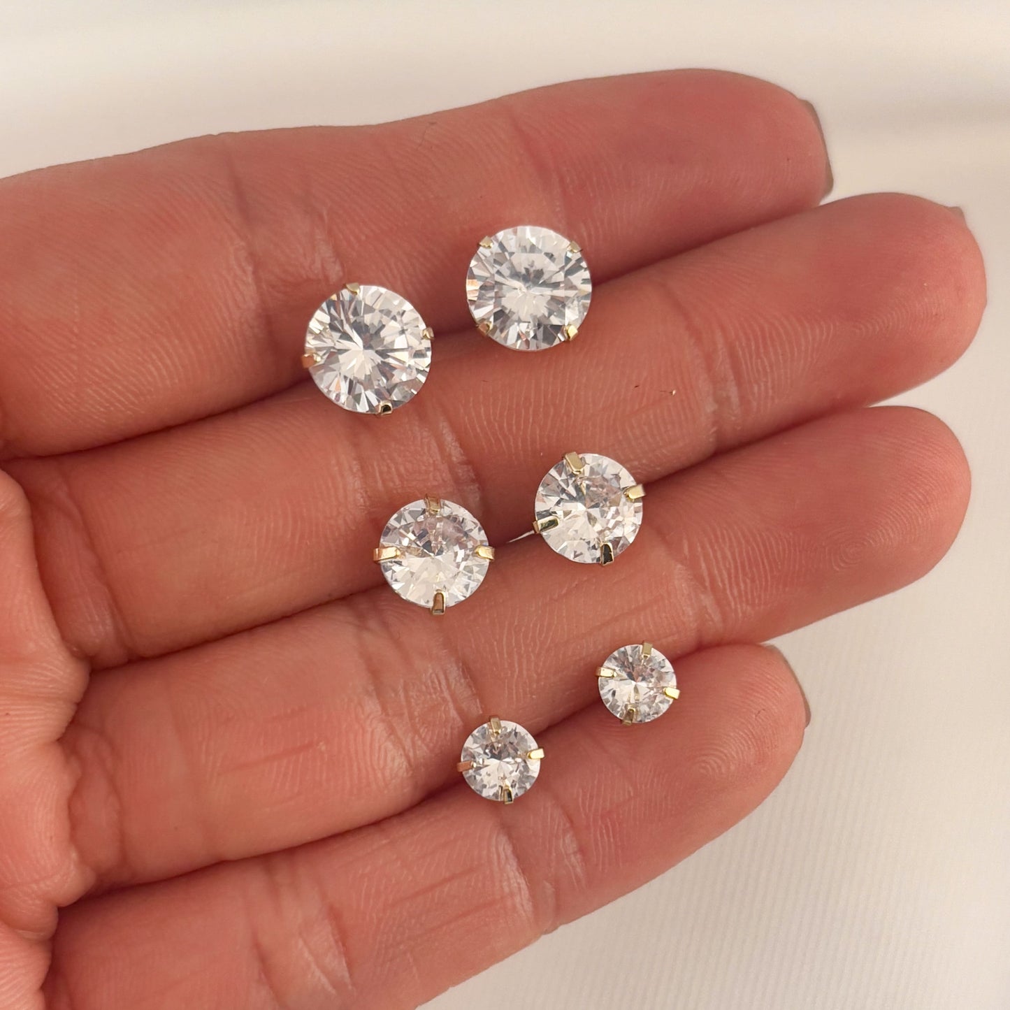 Broqueles chapa de oro zirconia