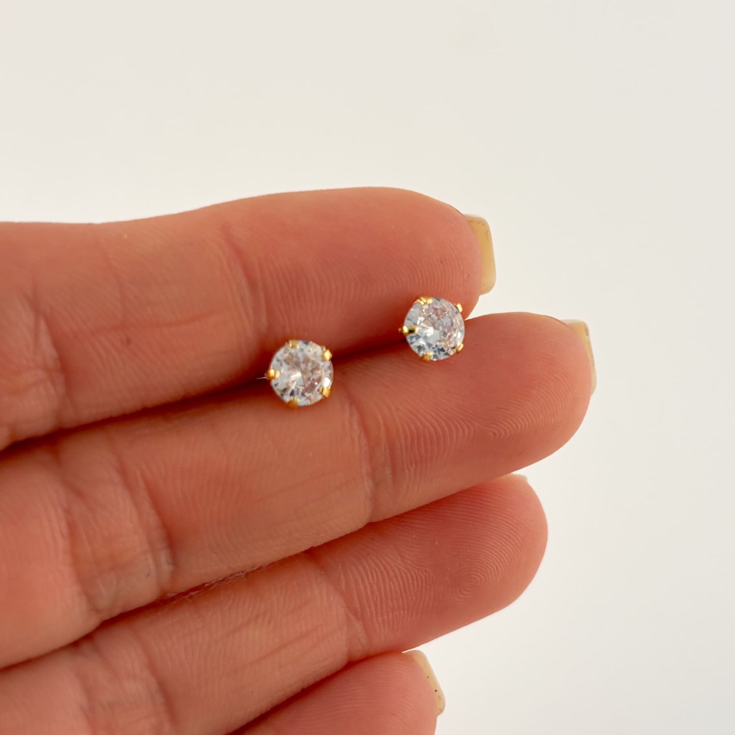 Broqueles chapa de oro zirconia