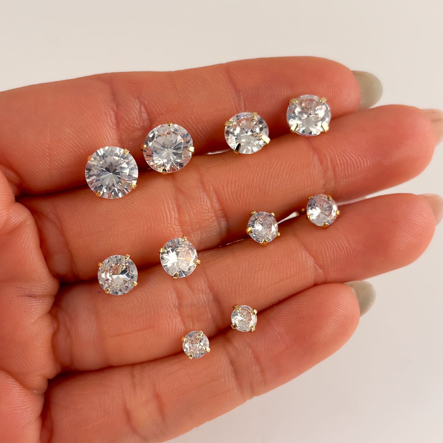 Broqueles chapa de oro zirconia