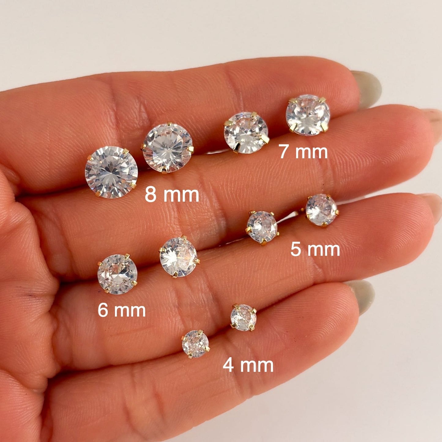 Broqueles chapa de oro zirconia