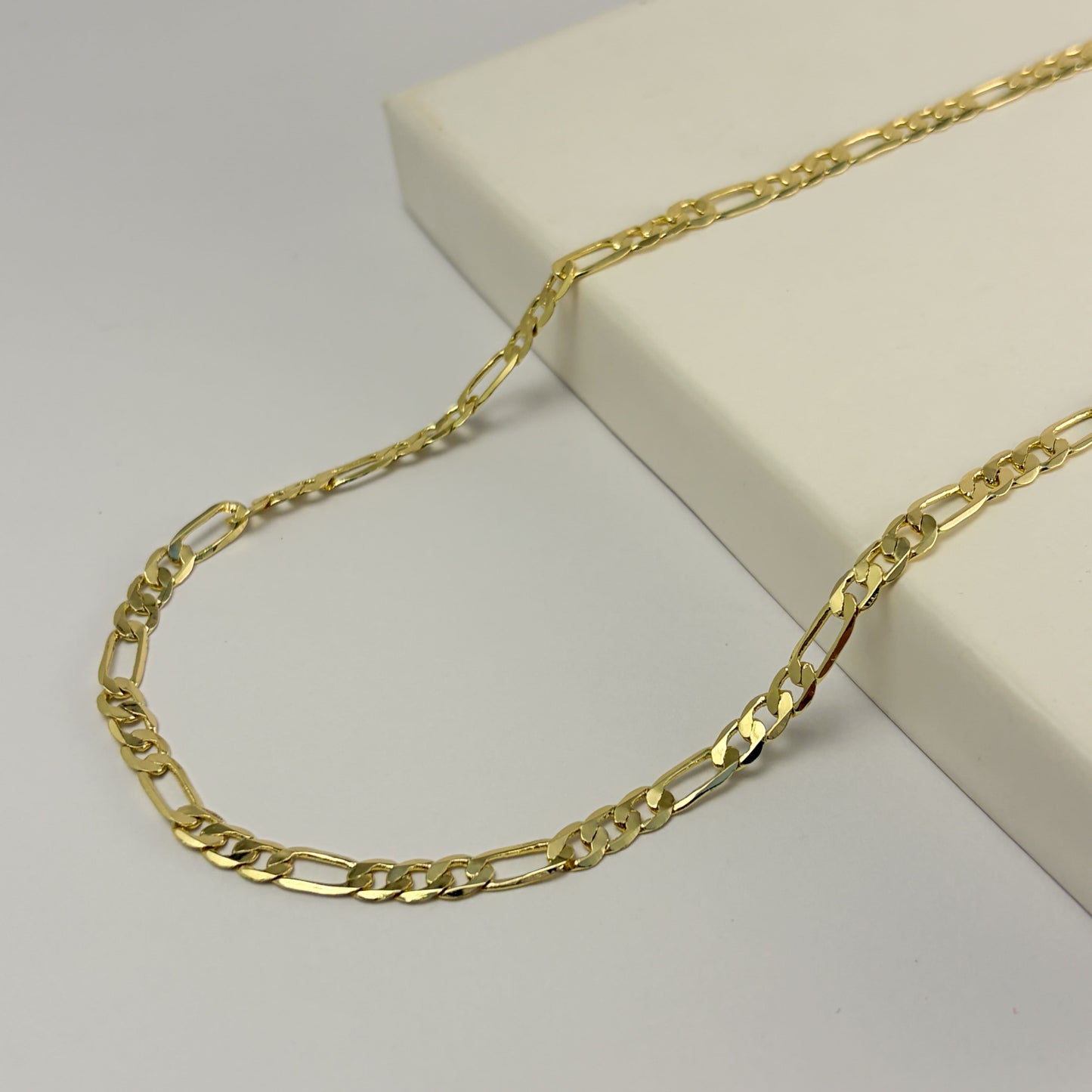 Cadena 3x1 delgada chapa de oro 55 cm