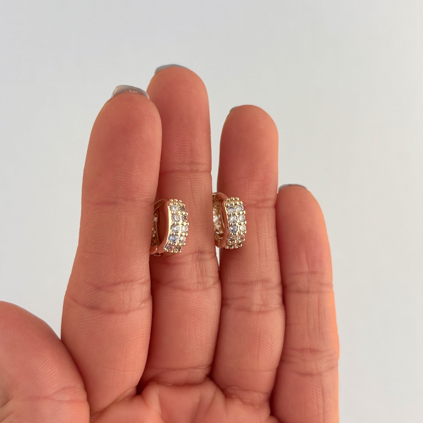 Huggies zirconias doble fila chapa de oro