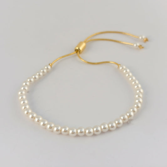 Pulsera perlas sintéticas ajustable chapa de oro 4mm