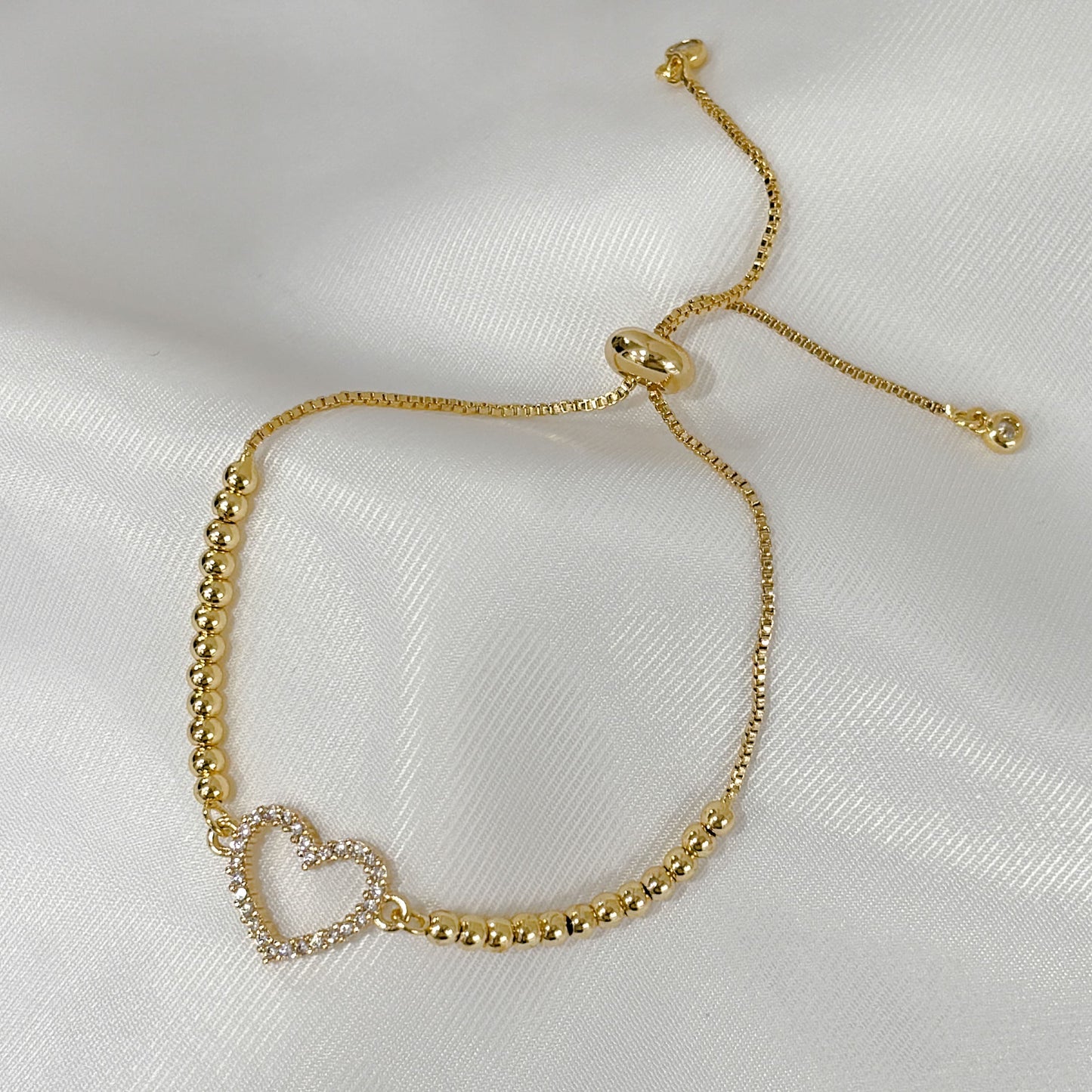 Pulsera chapa de oro ajustable corazón zirconia
