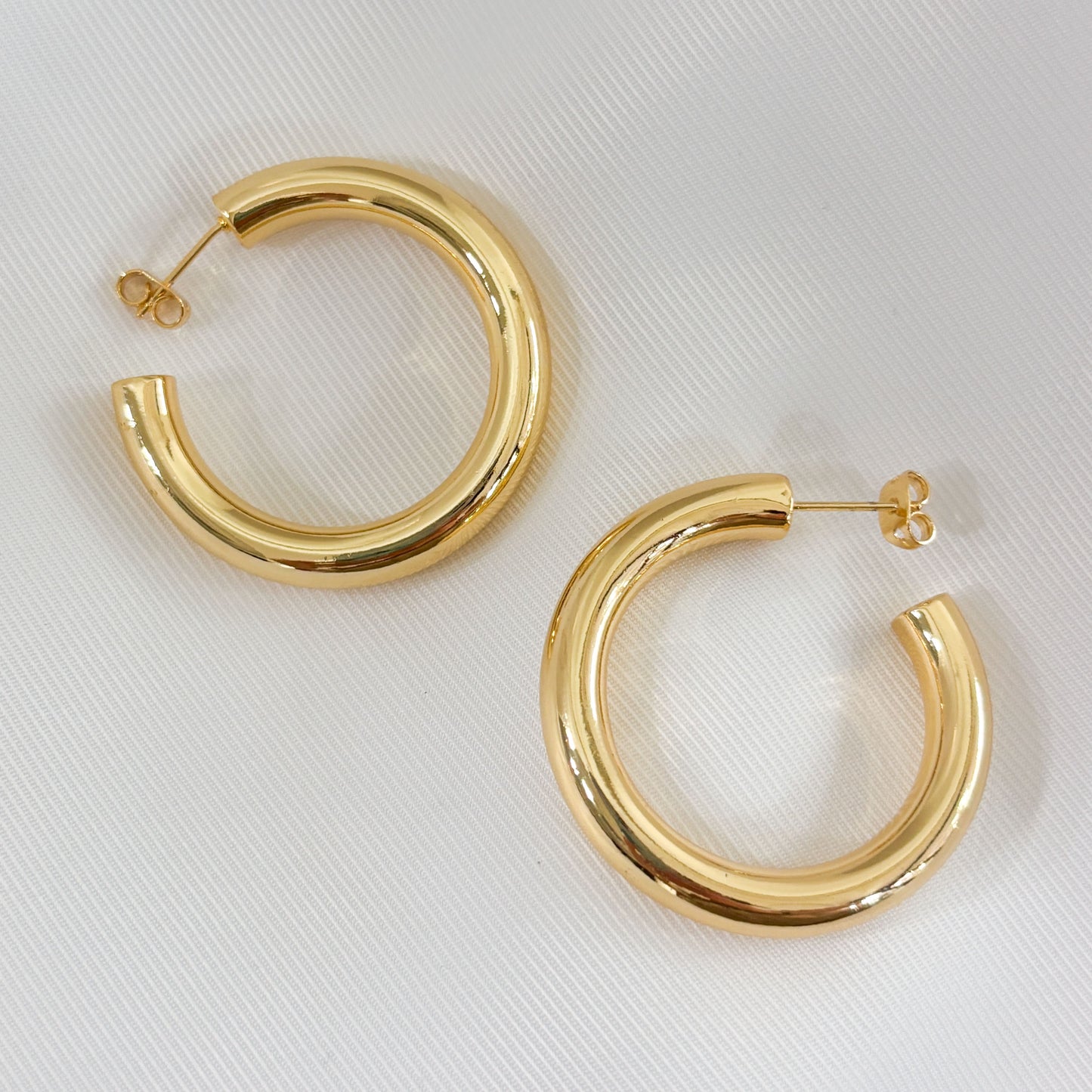 Semi arracadas tubulares 4 cm chapa de oro