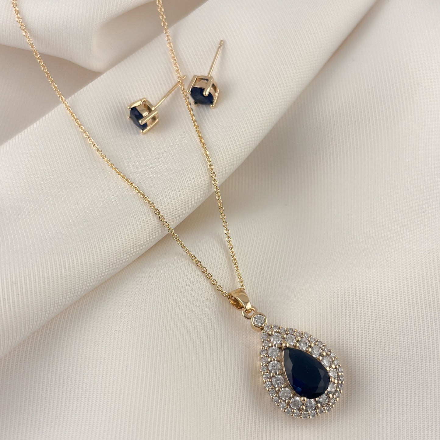 Set aretes y collar lágrima zirconia azul chapa de oro