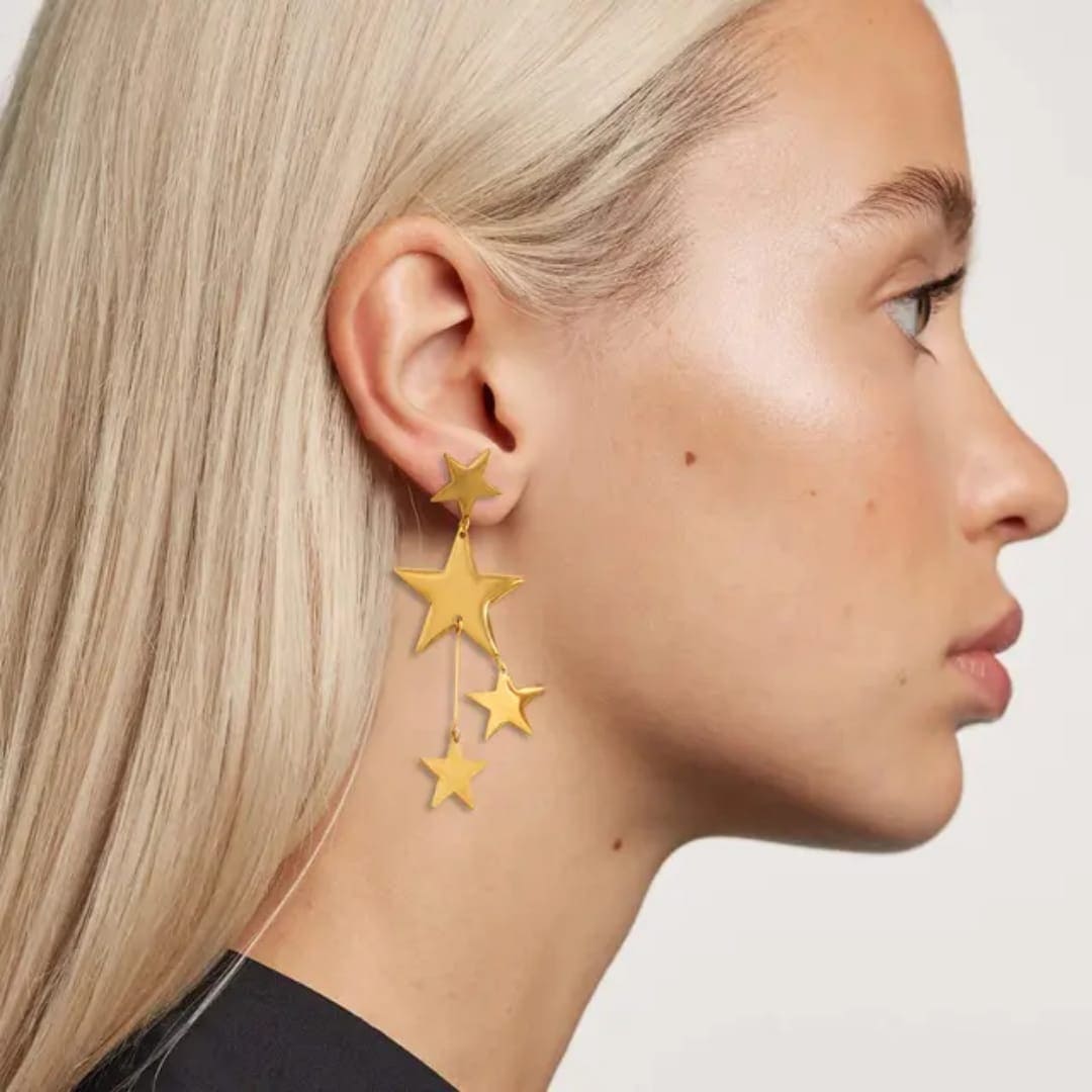 Aretes acero inoxidable premium estrellas dorado