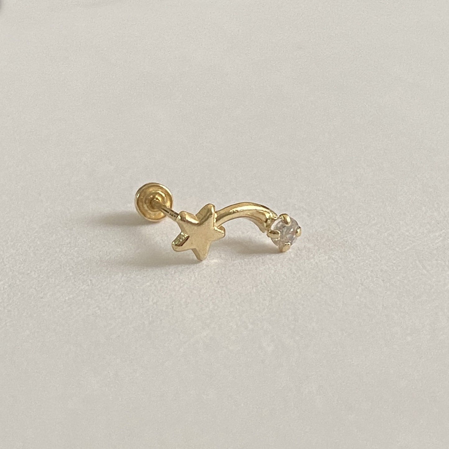 Piercing estrella fugaz 1 zirconia oro 10k