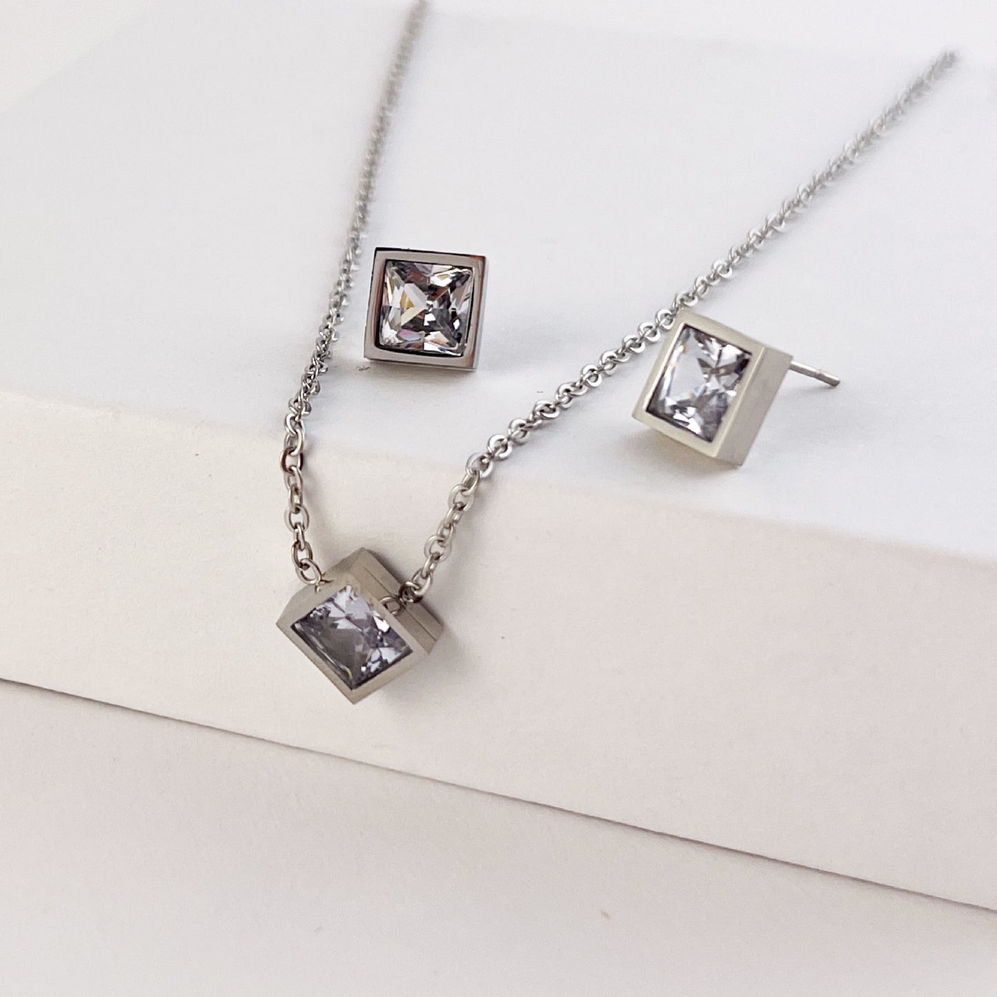 Set arete y collar acero inoxidable cristal rombo
