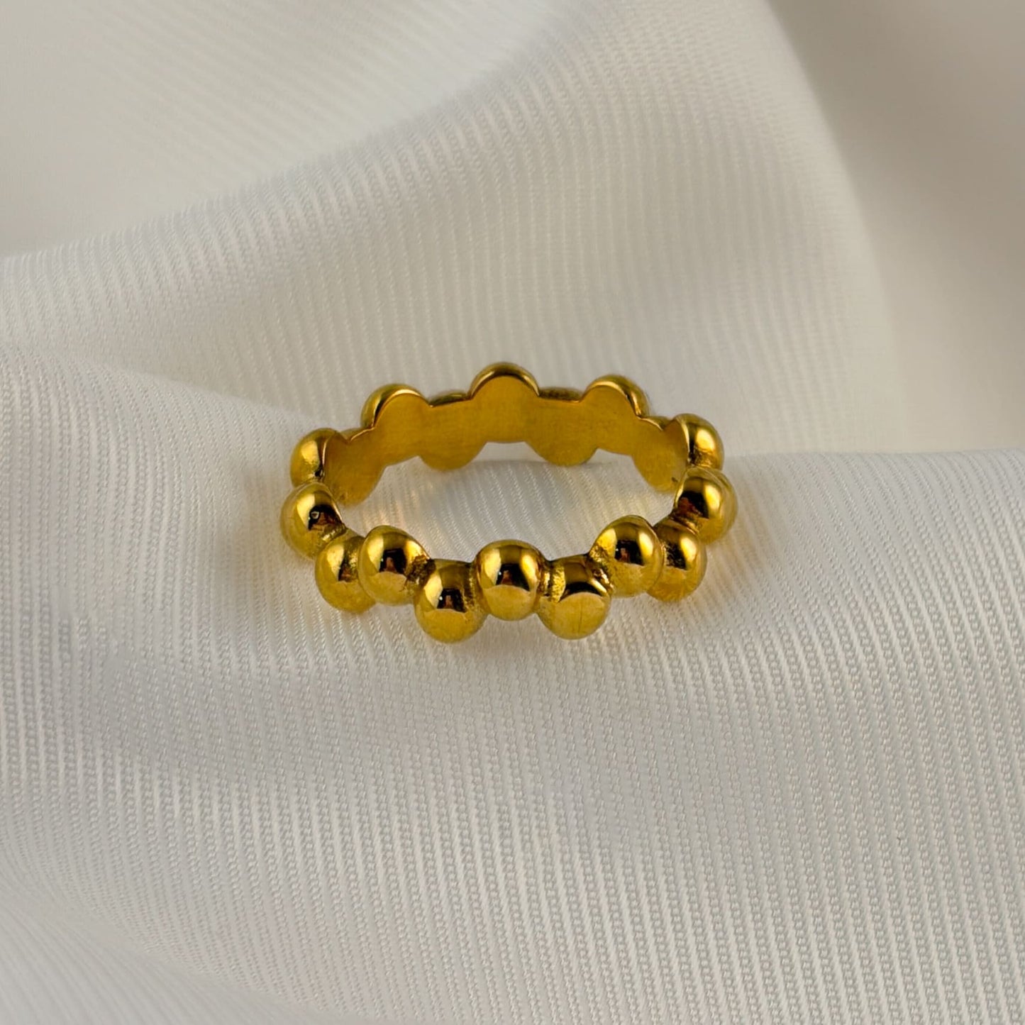 Anillo acero inoxidable burbujas dorado