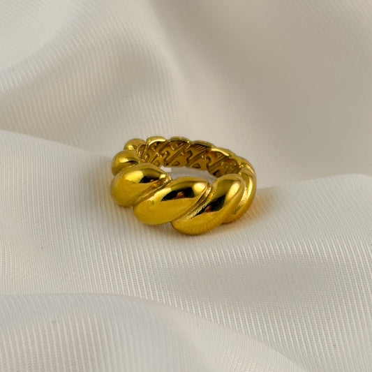 Anillo acero inoxidable dorado grueso trenzado