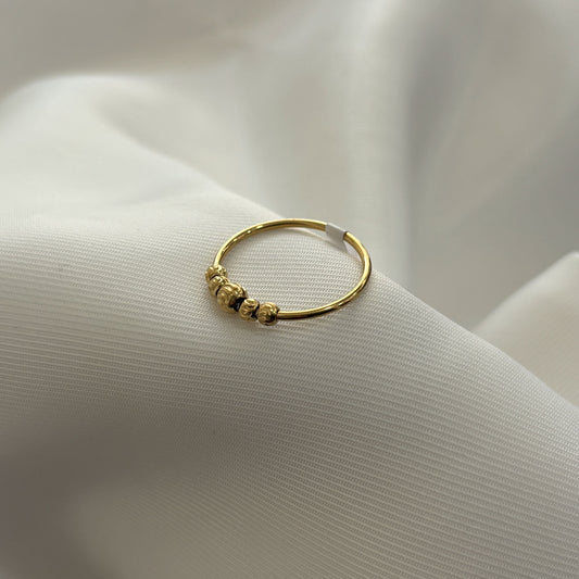 Anillo acero inoxidable delgado 5 bolitas diamantadas dorado