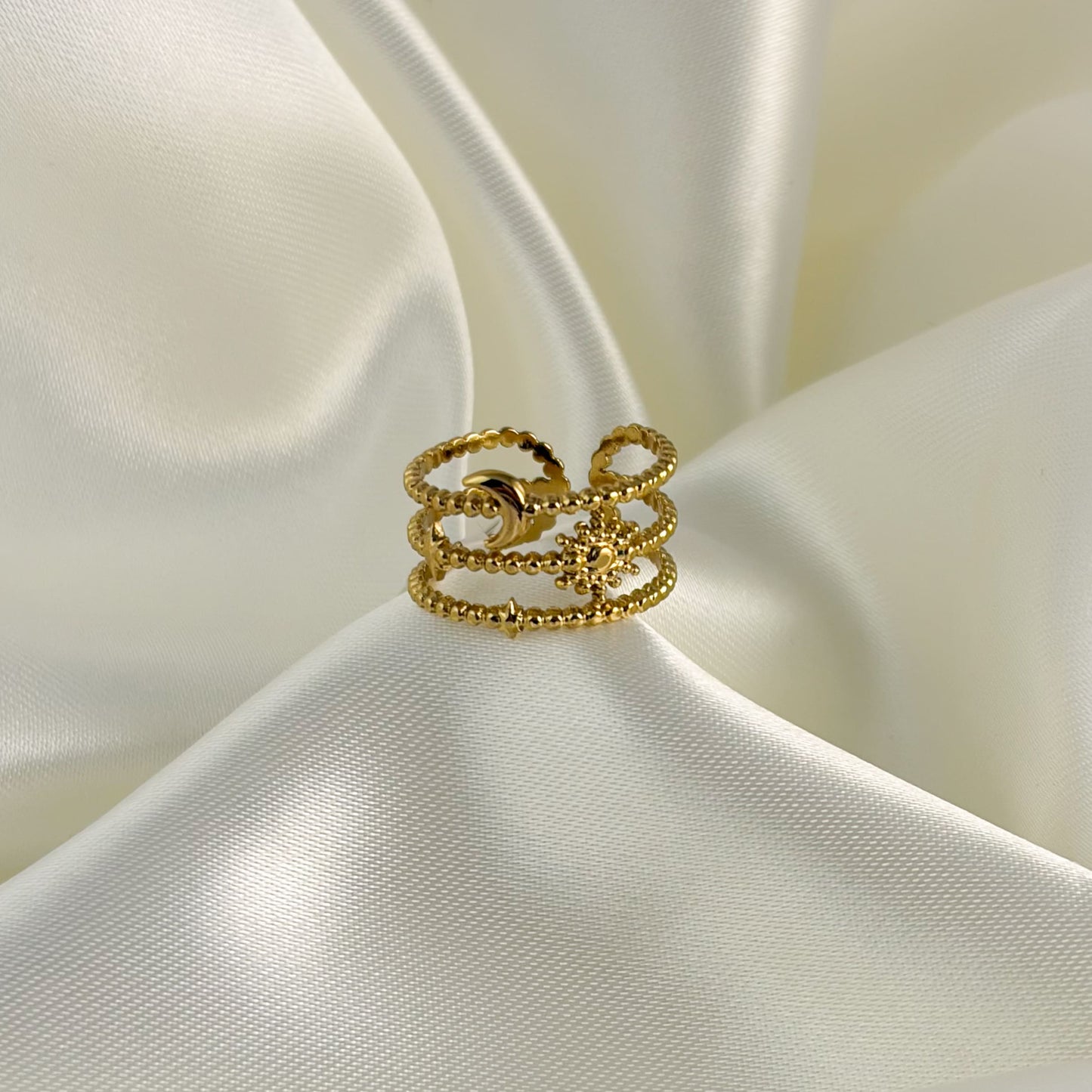 Anillo acero inoxidable dorado triple sol y luna ajustable