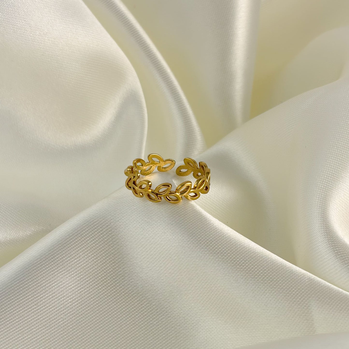 Anillo acero inoxidable ajustable hojitas