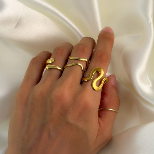 Anillo ondas arriba abajo acero inoxidable dorado