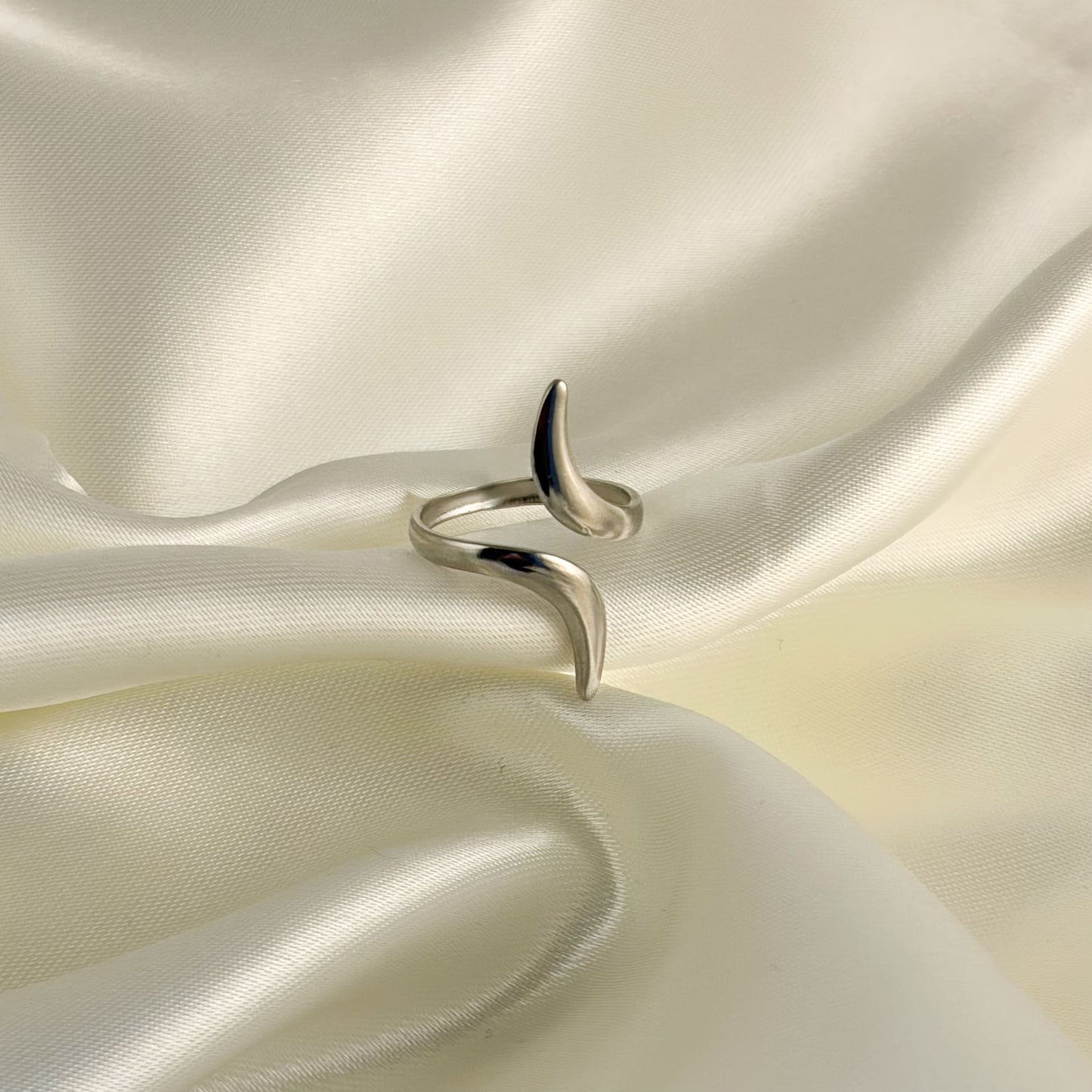Anillo acero inoxidable boomerang