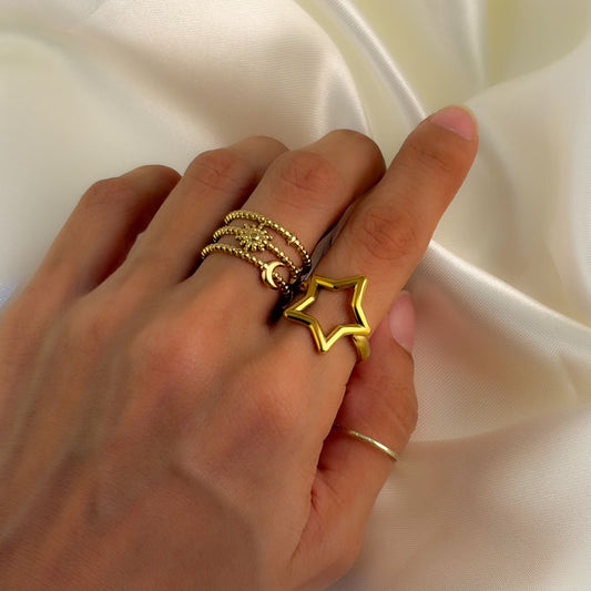 Anillo acero inoxidable dorado triple sol y luna ajustable
