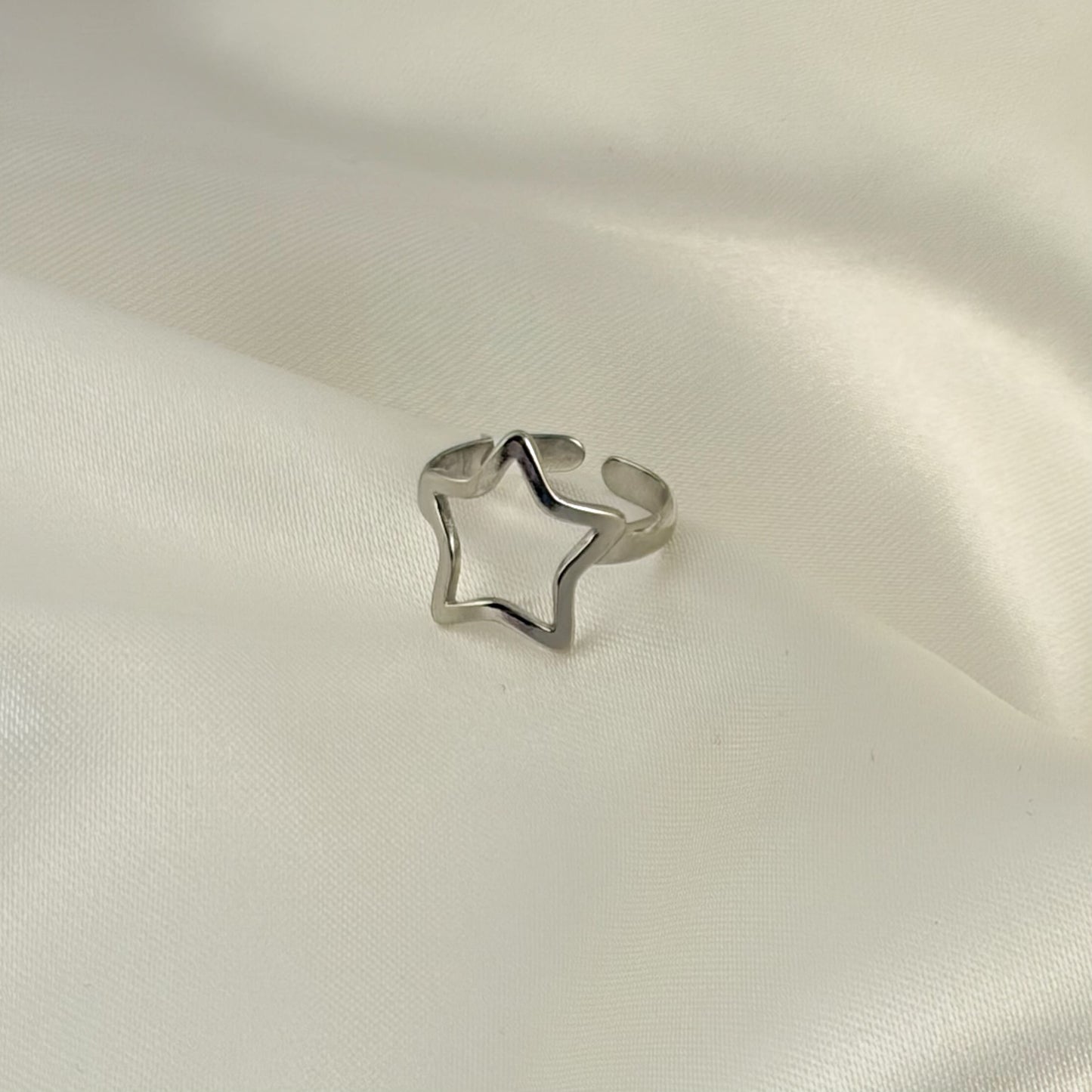 Anillo acero inoxidable estrella ajustable