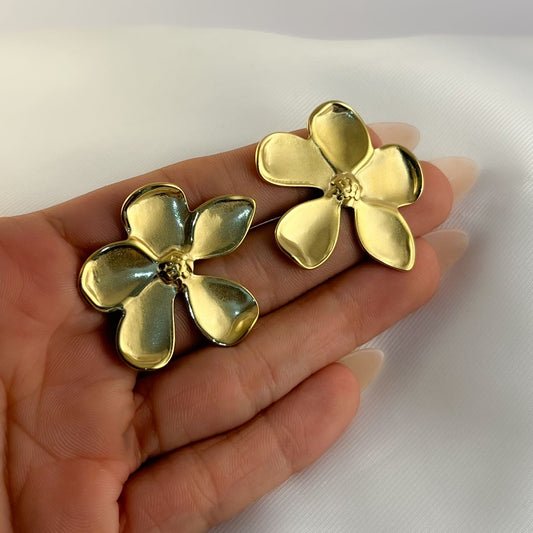 Aretes flor irregular acero inoxidable dorado