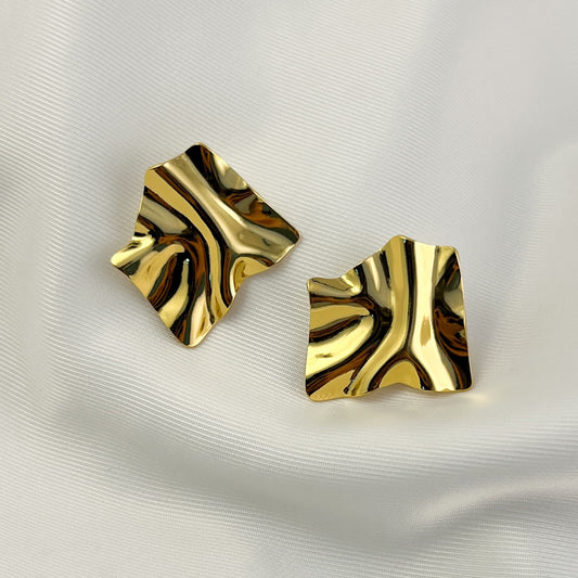 Aretes pegados acero inoxidable figura irregular dorado