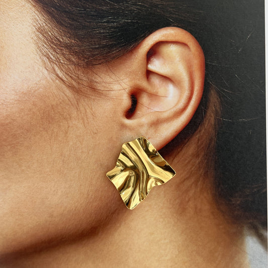 Aretes pegados acero inoxidable figura irregular dorado