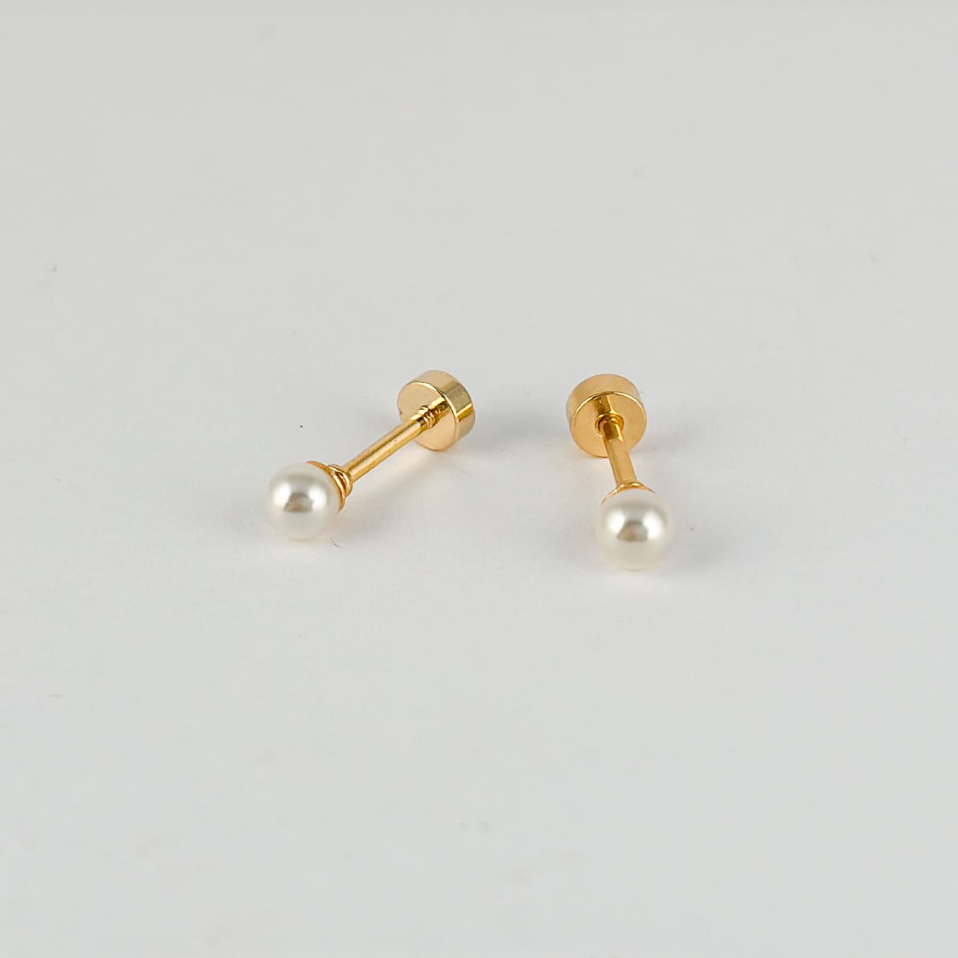 Broqueles acero inoxidable perla sintética 3 mm cierre de rosca