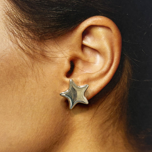 Broqueles grandes estrella acero inoxidable