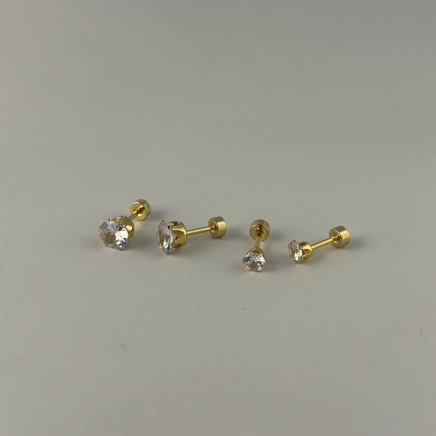 Broqueles zirconia acero inoxidable dorado