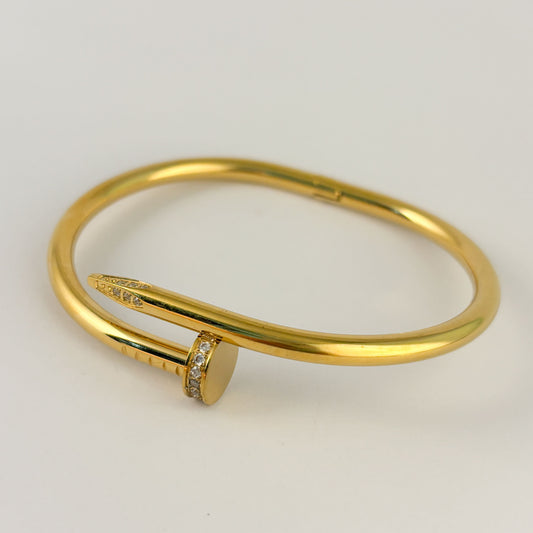 Brazalete clavo acero inoxidable con zirconias dorado