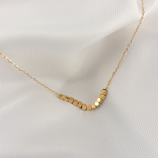 Collar acero inoxidable dots dorado
