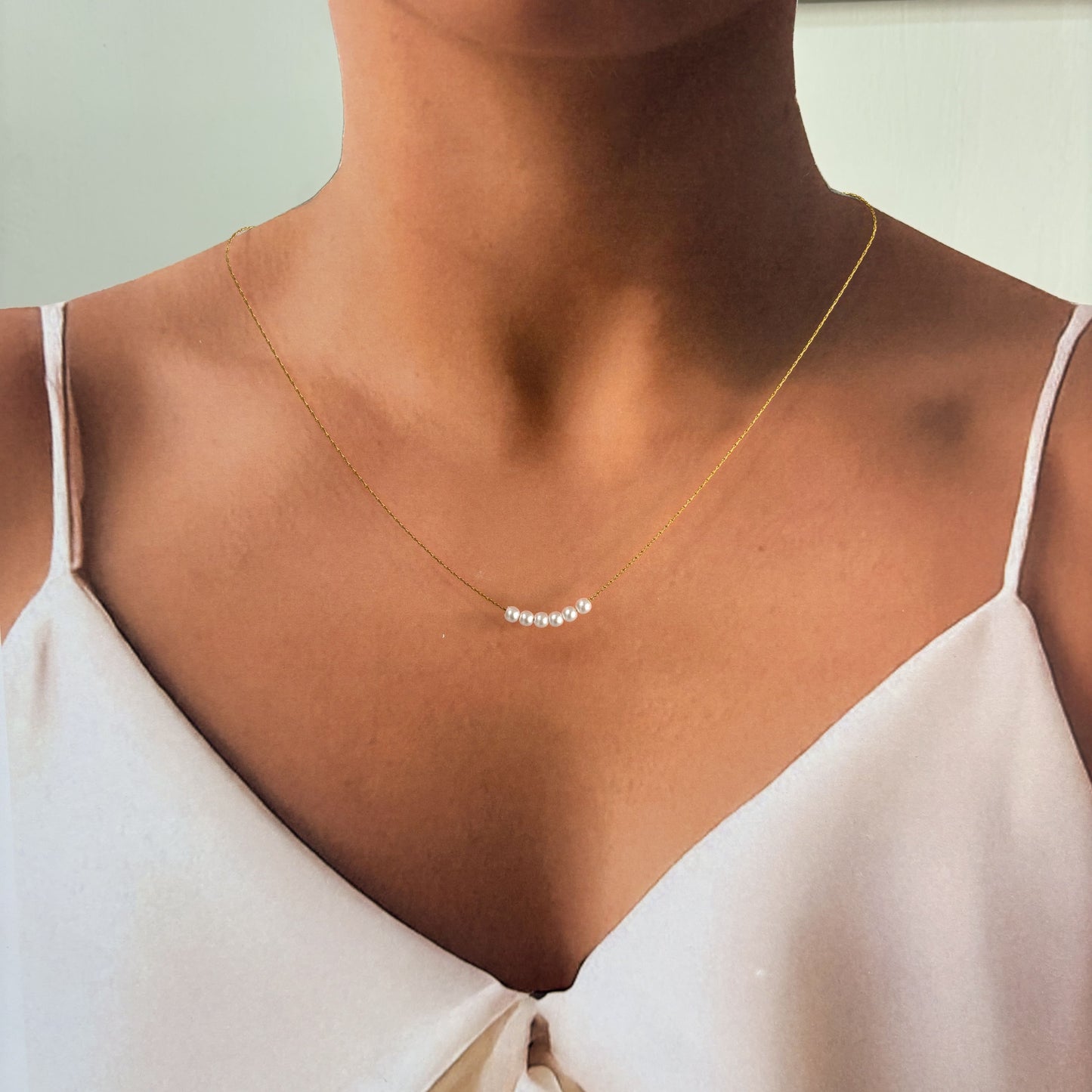 Collar acero inoxidable 6 perlitas dorado premium