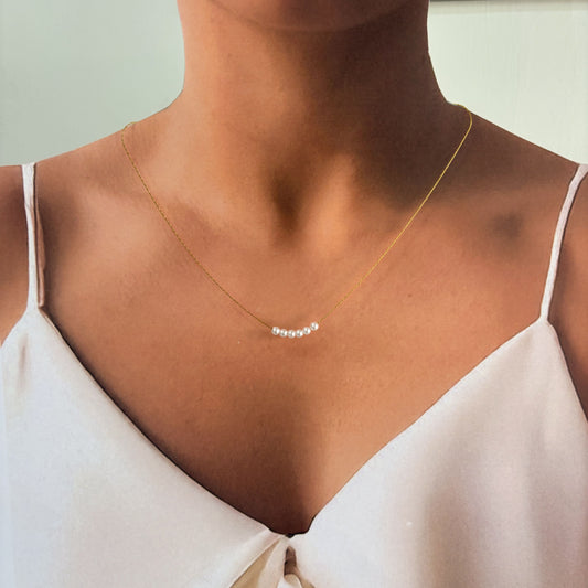 Collar acero inoxidable 6 perlitas dorado premium