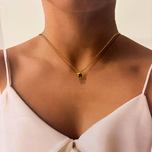 Collar estrella globo acero inoxidable dorado