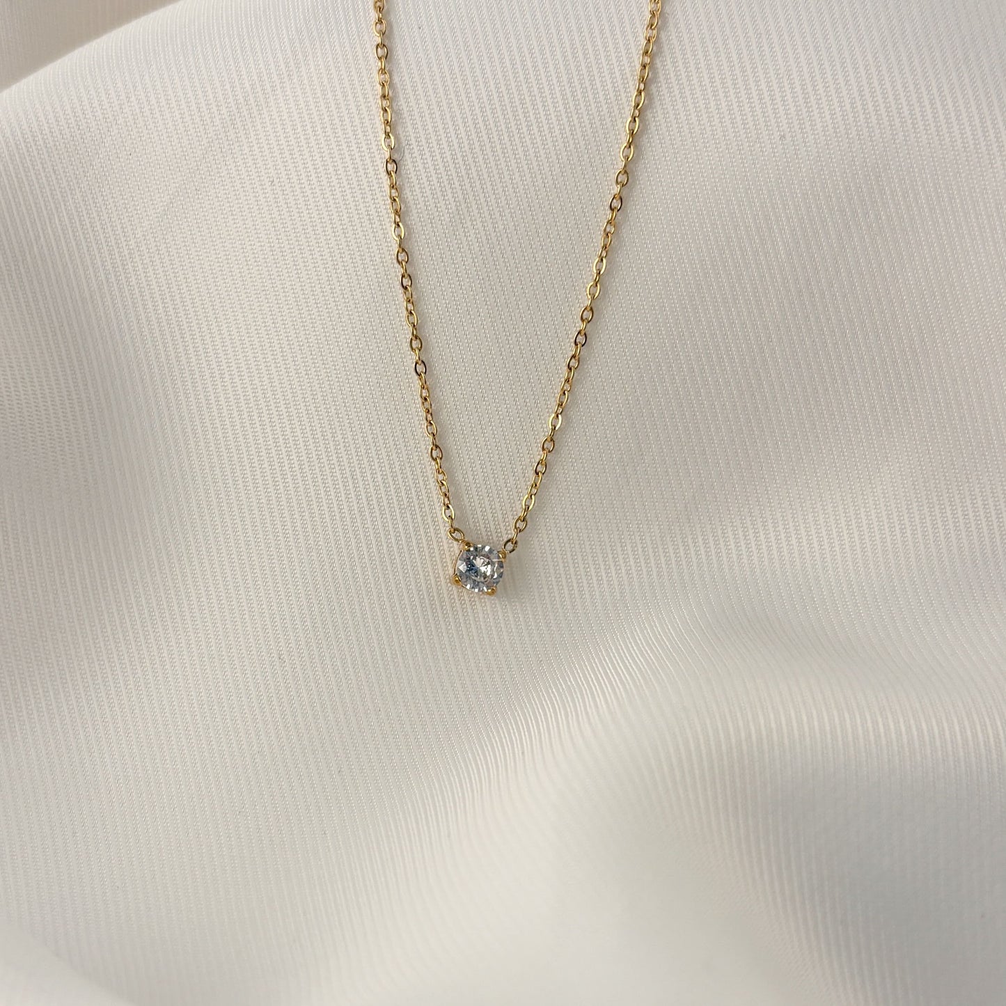 Collar mini zirconia acero inoxidable dorado