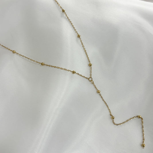 Collar acero inoxidable dorado corbatín bolitas
