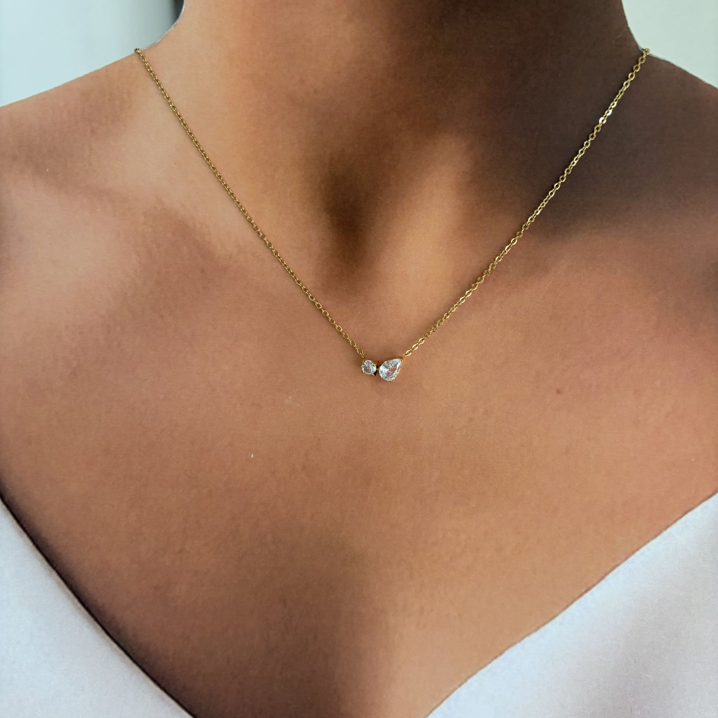 Collar acero inoxidable zirconias gota tù y yo dorado