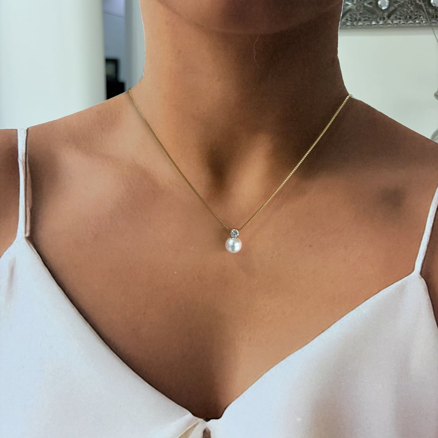 Collar perla acero inoxidable dorado con un cristal
